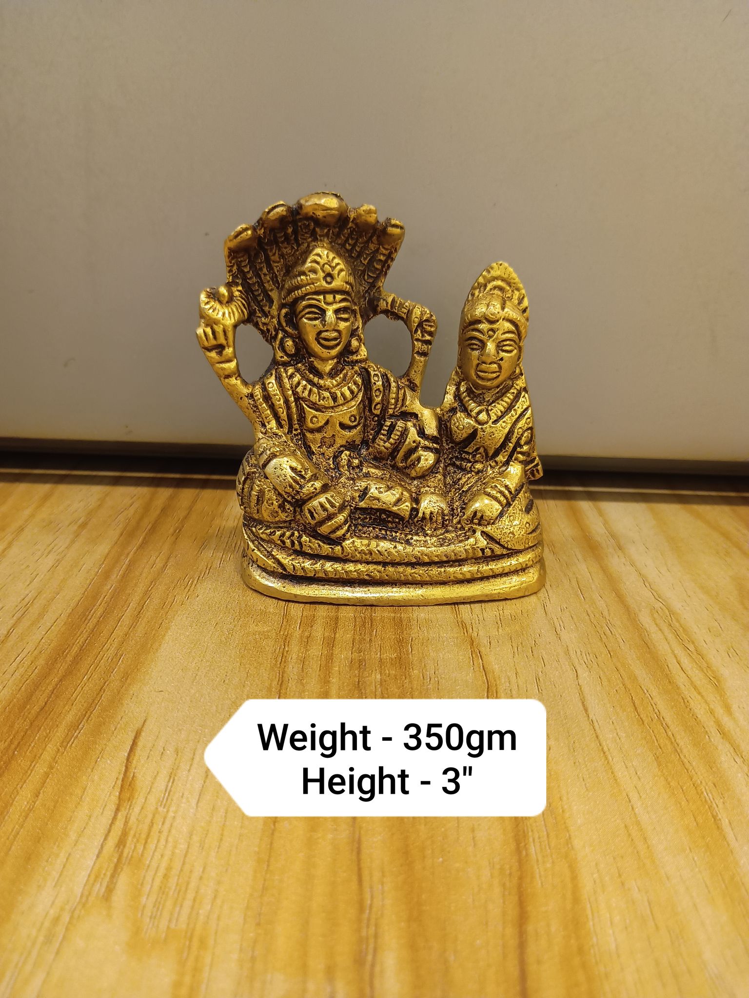 vishnu laxmi sitting